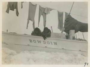 Image of Bow of Bowdoin - Eskimo children leaning over rail